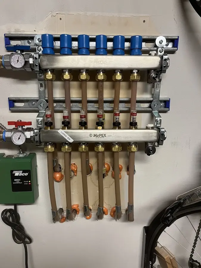 Plumber performing Water Heater Repair at a residential property in Waseca