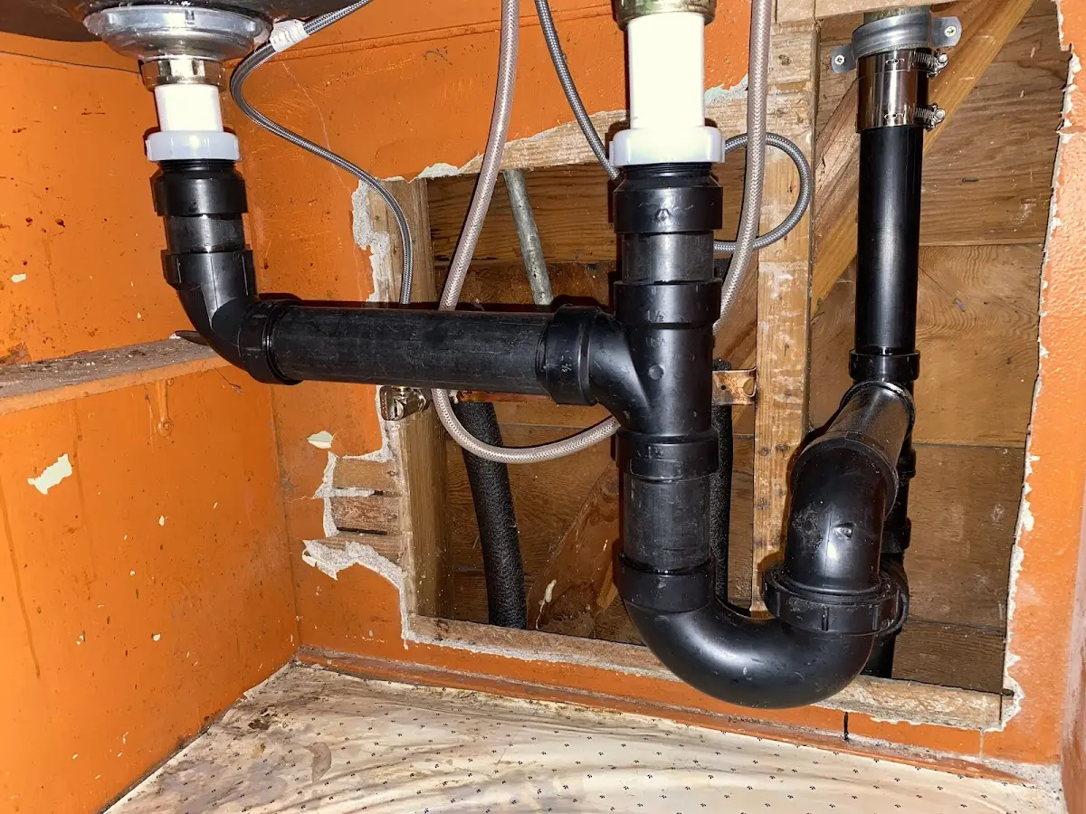Professional Garbage Disposal Repair equipment and tools on the job in Waseca